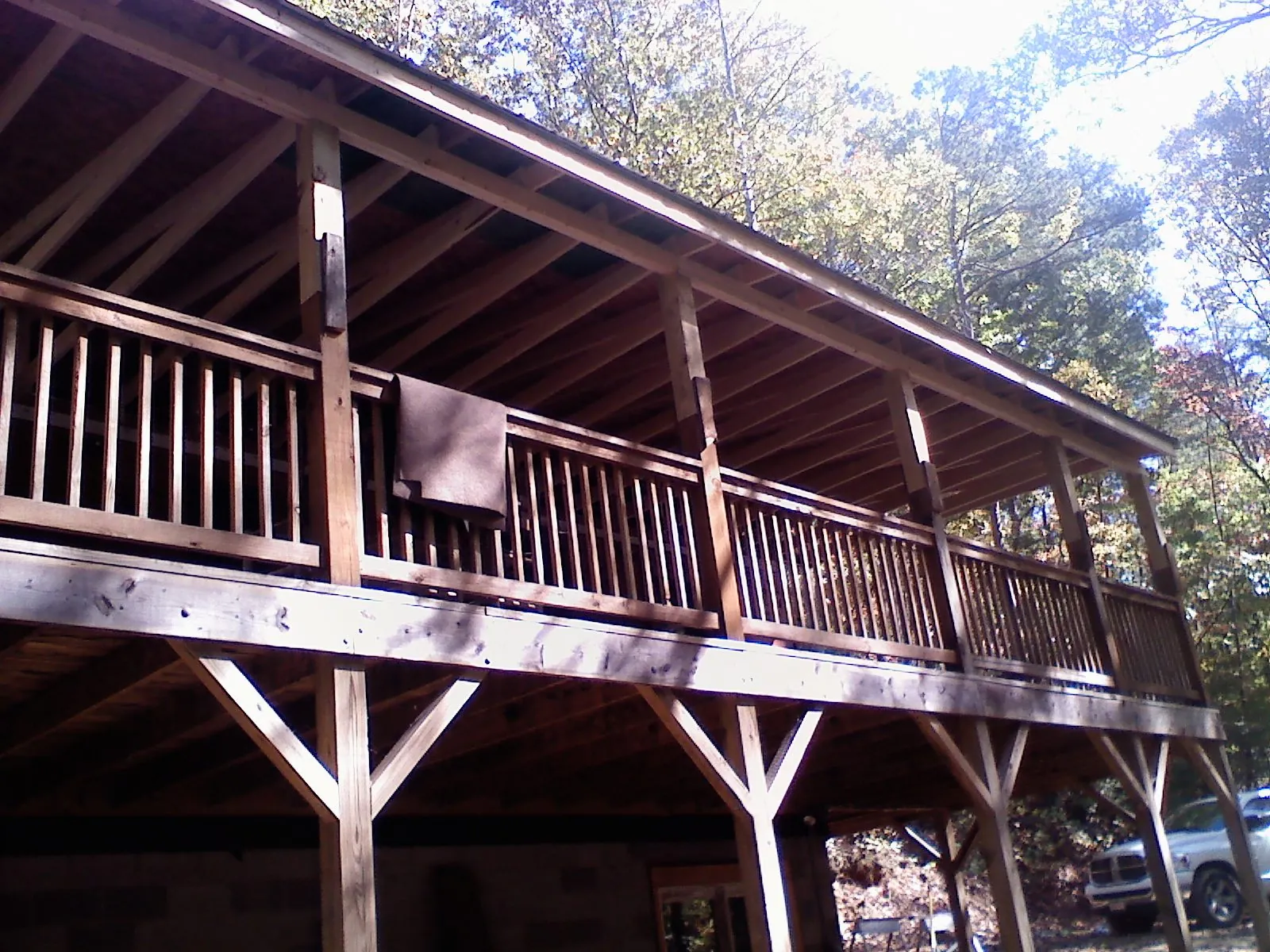 Timber framing under a new elevated porch and deck — Roof Leak Repair in Carter Lake by Roofing Brothers